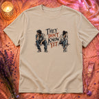 They Don't Know T-Shirt TG151 - Sand Flatlay